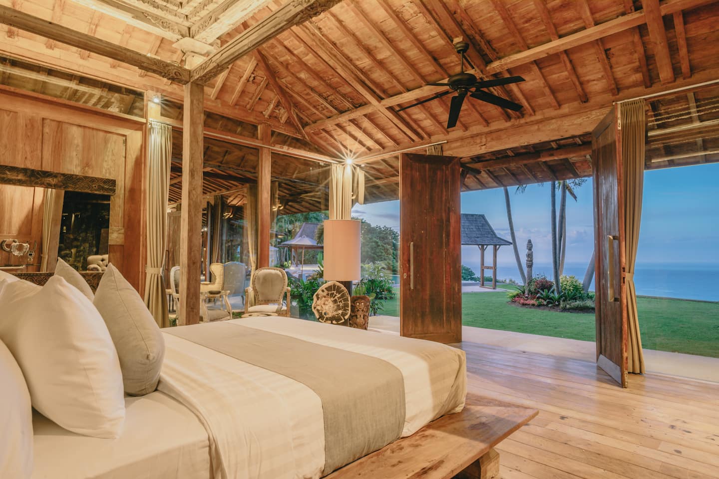 King joglo suite opening onto the garden and sea